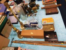 Two brass lamp stands & an assortment of sundry it