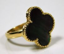 An 18ct gold "lucky clover" ring set with mother o