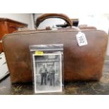 A leather Gladstone doctors bag, formerly belongin