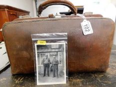A leather Gladstone doctors bag, formerly belongin