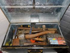 A steel box of tools including a box of routers