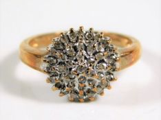 A 9ct gold diamond cluster ring of 0.25ct 3.3g