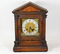 A brass & silvered dial oak mantle clock