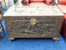 A large early 20thC. carved camphor wood chest