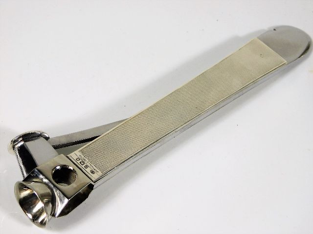 A large silver Dunhill cigar cutter 138g