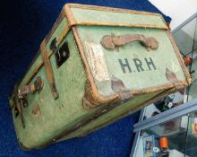 An antique travel trunk with leather fittings, ini
