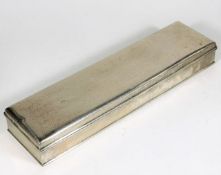 A plain silver box 10.75in long