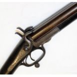 A Victorian George Gibbs double barrelled shotgun