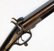 A Victorian George Gibbs double barrelled shotgun