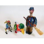 Three tinplate toys, two of which are clockwork