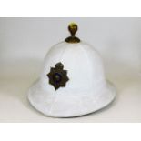 Gibraltar pith helmet with badge