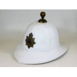 Gibraltar pith helmet with badge