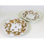 A pair Meissen plates with gilding to relief decor