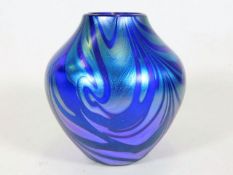An Okra iridescent glass vase 4in tall