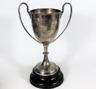 A DCLI silver cup with stand 1913 winner David Pot