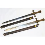 A pair of brass handled DCLI swords with scabbards