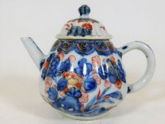 A small 19thC. Japanese teapot with Imari decor