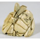 A c.1900 Japanese carved ivory netsuke of a Buddha