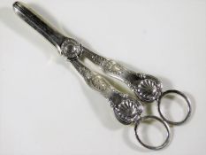 A pair of heavy gauge silver grape scissors