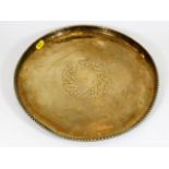 A Hugh Wallis brass tray with holly decor, signed,