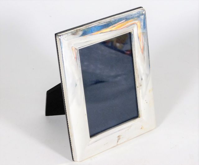 A modern sterling silver photo frame with box