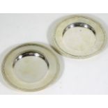 Two plain silver dishes of heavy gauge