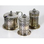 A blue glass lined silver cruet set with mustard