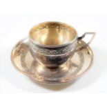 A French silver chocolate cup & saucer, inscribed