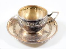 A French silver chocolate cup & saucer, inscribed
