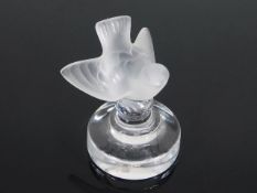 A small Lalique glass bird paperweight 2.75in tall & three small Lalique collectors books