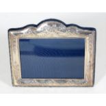 A decorative modern silver photo frame