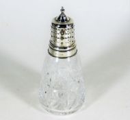 A silver topped cut glass sugar sifter