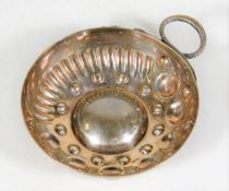 A French silver tastevin with stylised snake handl