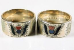 A pair of hallmarked silver napkin rings with chas