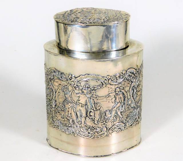 A German silver tea caddy with embossed decor