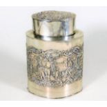 A German silver tea caddy with embossed decor