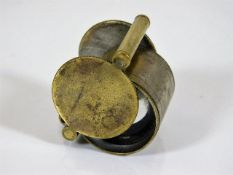 A brass cased loupe