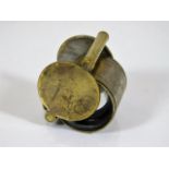 A brass cased loupe