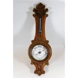 An early 20thC. oak cased barometer R. H. Sibly, P