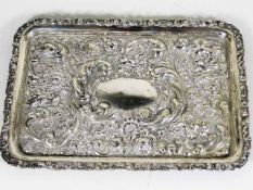 An embossed silver tray, some faults 11.5in wide
