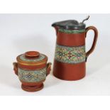 A Prattware terracotta lidded jug twinned with a s