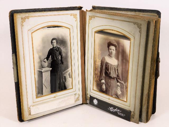 A 19thC. family photo album, faults to spine