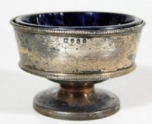 A small early Victorian silver salt with blue line