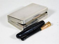 A heavy gauge silver cigarette case twinned with a