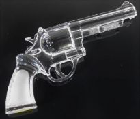 A novelty glass replica revolver