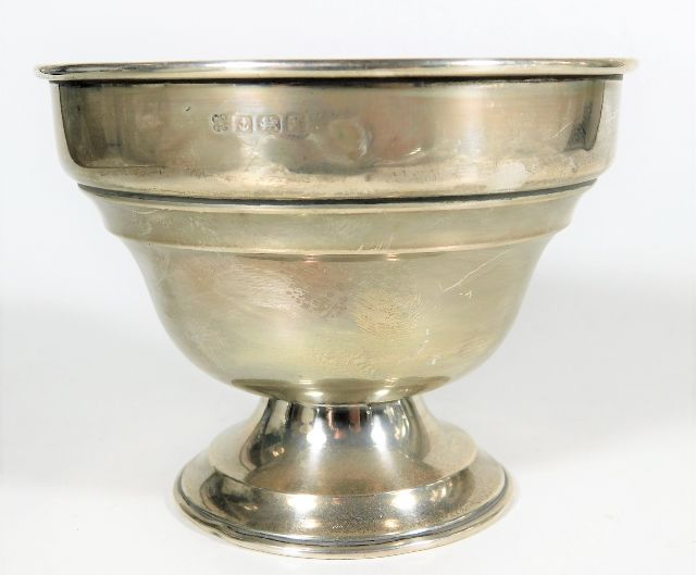 A small silver footed bonbon dish