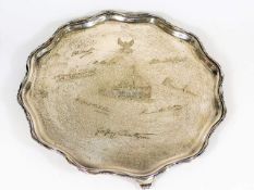 An antique silver tray with the inscriptions of Ll