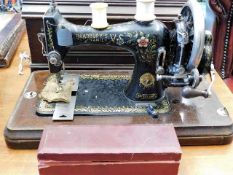 A Victorian Bradbury's Family sewing machine with