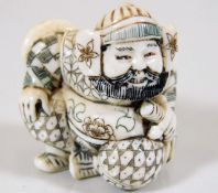 A c.1900 coloured Japanese carved ivory of samurai