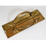 A pair of good quality brass art nouveau door pull